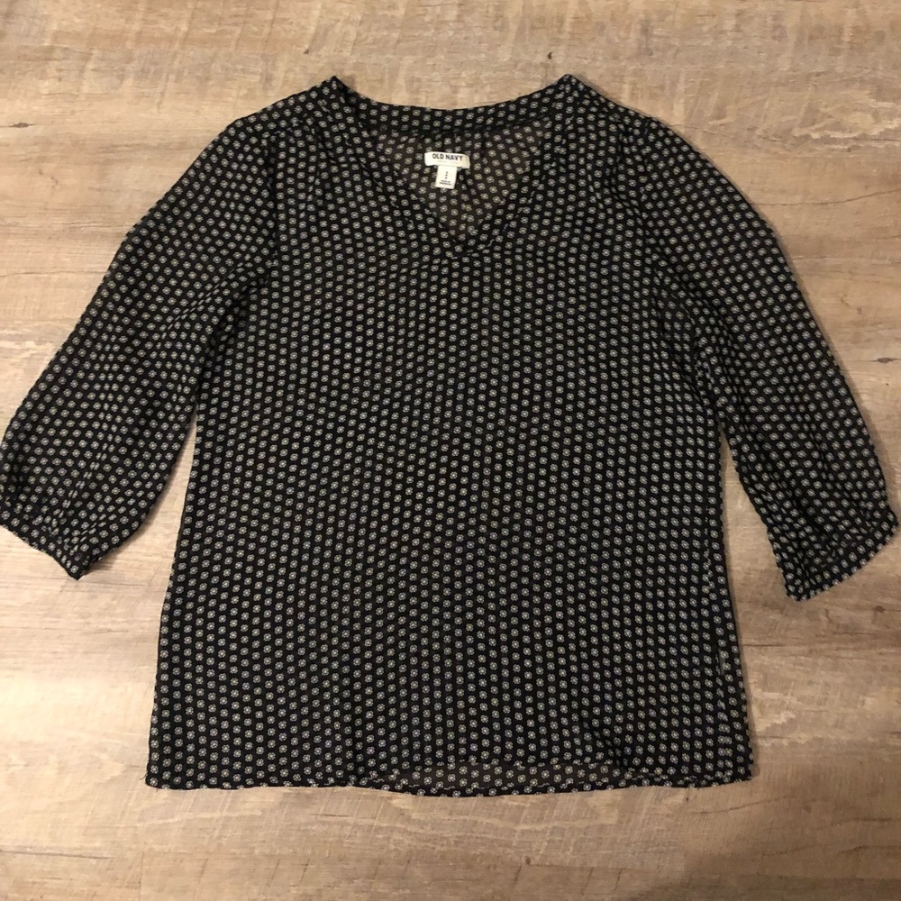 Black and white patterned v-neck blouse size small
